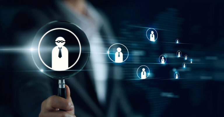 Businessman holding magnifying glass, searching for good and quality employees. officer looking for employee represented by icon. Recruitment, CRM, human resource, HR, teamwork concept